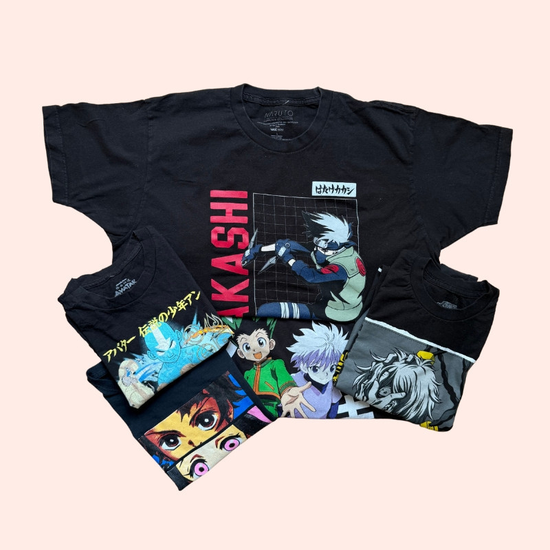 “Bundles of vintage and preloved NASA t-shirts with retro space-themed graphics and logos.” “Bundles of vintage and preloved NASA t-shirts with retro space-themed graphics and logos.”