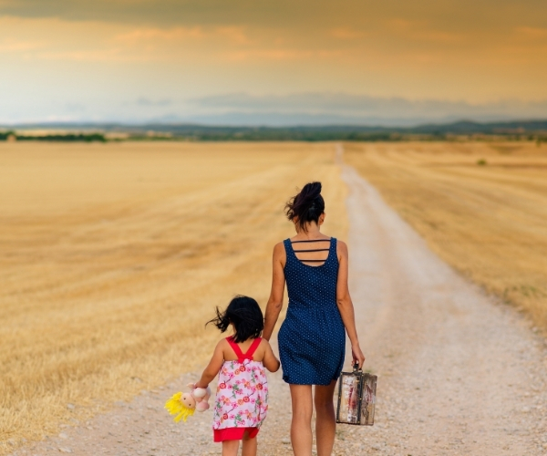 Our Story The Vintage Clothing Store Mother and Daughter holding hands blog post